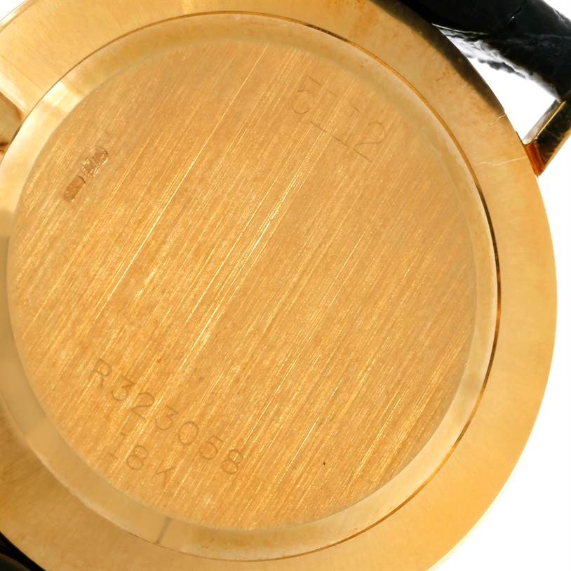 This is an image of the back case of a Rolex Cellini 5112 Men
s Yellow Gold Champagne Dial 5112 Men
s Yellow Gold Champagne Dial watch.