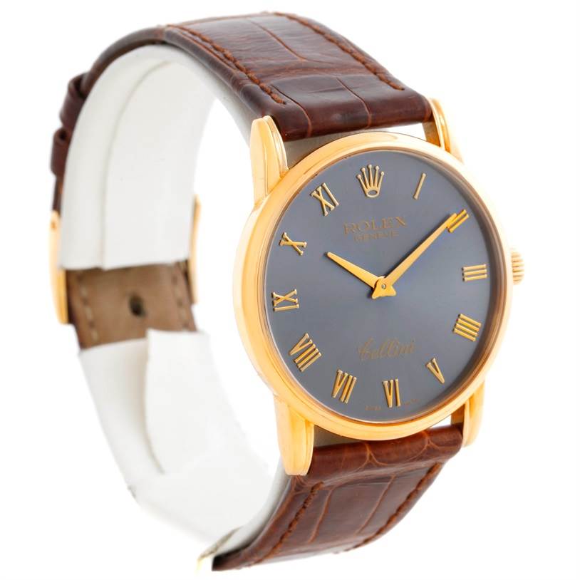 The image captures a three-quarter view of the Rolex Cellini 5116 Men's Yellow Gold Grey Dial 5116 Men's Yellow Gold Grey Dial watch, showcasing its face, strap, and side profile.