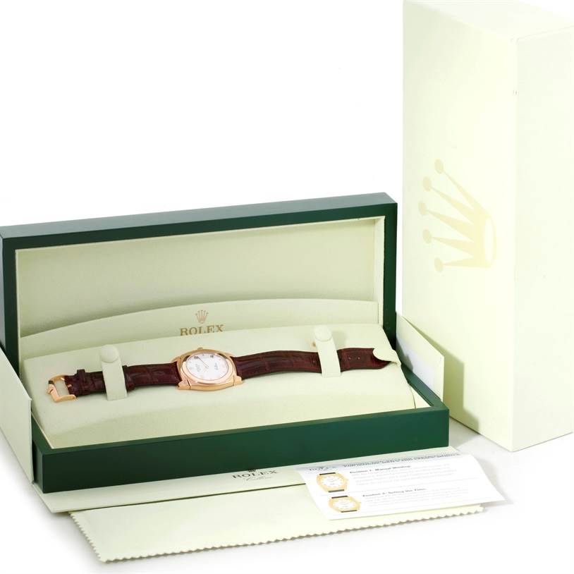The image shows a Rolex Cellini 5330 Men's Rose Gold White Dial 5330 Men's Rose Gold White Dial watch in its box, displayed at an angle revealing the watch face, strap, and accompanying accessories.