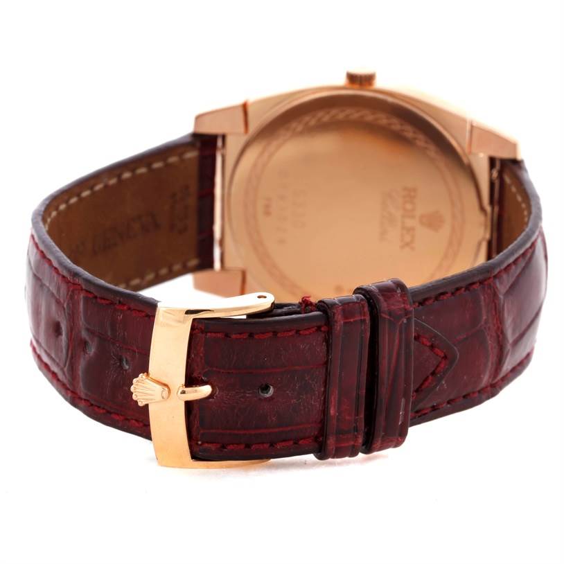 The image shows the back view of a Rolex Cellini 5330 Men's Rose Gold White Dial 5330 Men's Rose Gold White Dial watch, focusing on its leather strap and clasp.