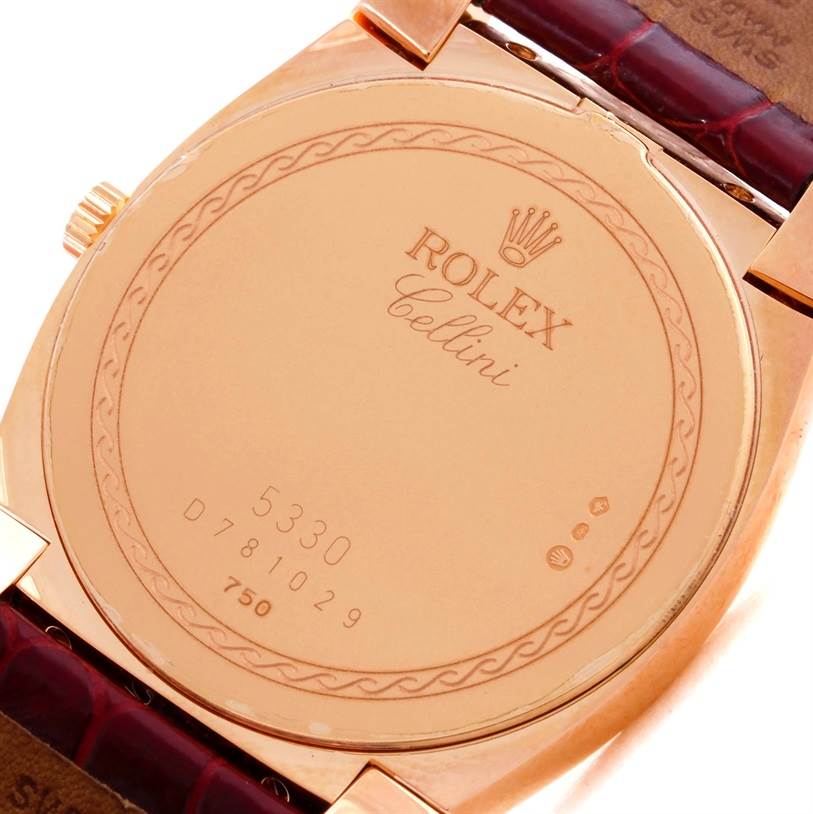 The image shows the back case of a Rolex Cellini 5330 Men's Rose Gold White Dial 5330 Men's Rose Gold White Dial watch, including the model number and engravings.