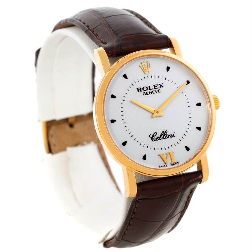 The image shows a front-angle view of the Rolex Cellini 5115 Men
s Yellow Gold Silver Dial 5115 Men
s Yellow Gold Silver Dial watch, displaying its white dial, gold casing, and brown leather strap.