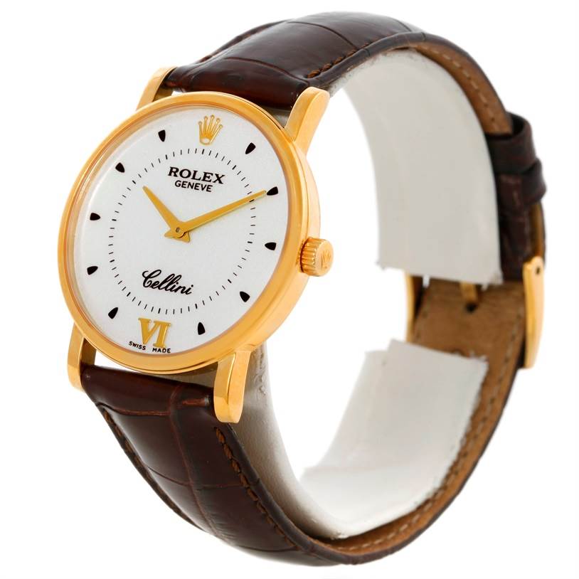 The image shows a Rolex Cellini 5115 Men
s Yellow Gold Silver Dial 5115 Men
s Yellow Gold Silver Dial watch at an angled side view, displaying the dial, case, and leather strap.