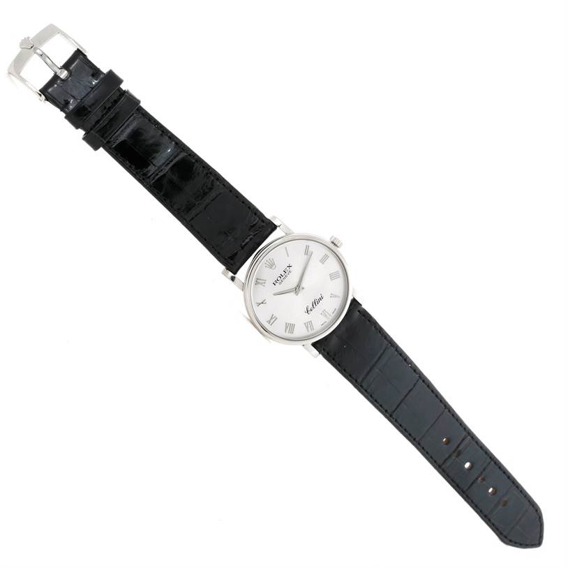 This image shows a Rolex Cellini 5115 Men's White Gold Silver Dial 5115 Men's White Gold Silver Dial watch with a black leather strap, displayed from a top-down angle.