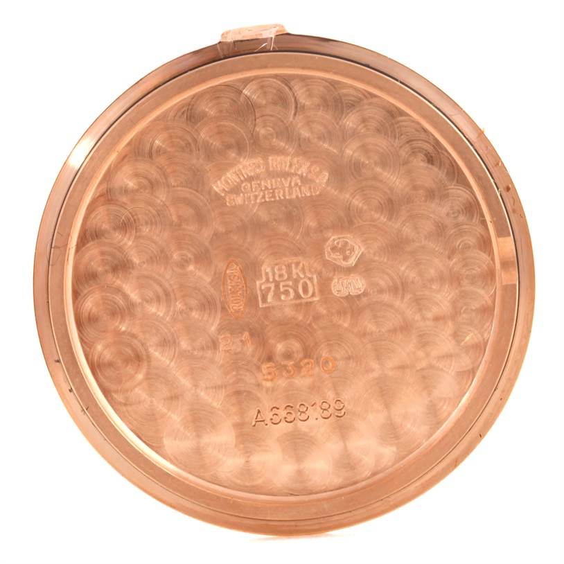 This is the inside view of the case back for the Rolex Cellini 5320 Rose Gold White Dial 5320 Rose Gold White Dial model, displaying various engravings and markings.