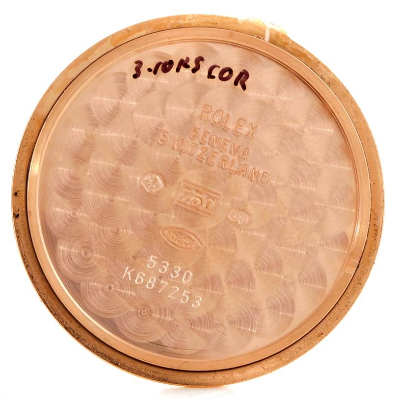 The image shows the inner case back of a Rolex Cellini 5330 Men's Rose Gold White Dial 5330 Men's Rose Gold White Dial watch viewed from a top-down angle.