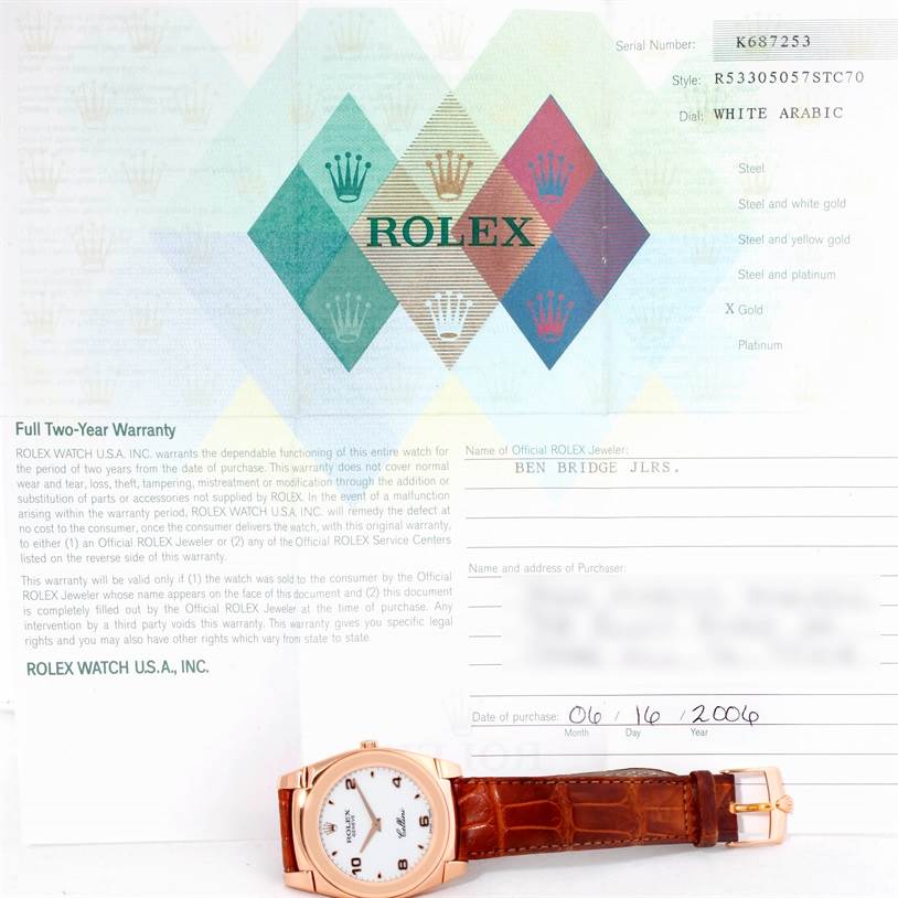 The image shows a front view of the Rolex Cellini 5330 Men's Rose Gold White Dial 5330 Men's Rose Gold White Dial model, placed on a warranty document.