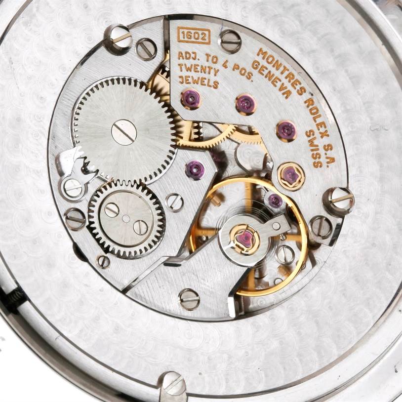 This image shows the intricate movement mechanism of a Rolex Cellini 4243 Men's White Gold Black Dial 4243 Men's White Gold Black Dial watch at a close-up angle.