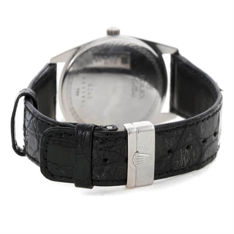 The image shows the back of the Rolex Cellini 4243 Men's White Gold Black Dial 4243 Men's White Gold Black Dial watch focusing on the leather strap and clasp.