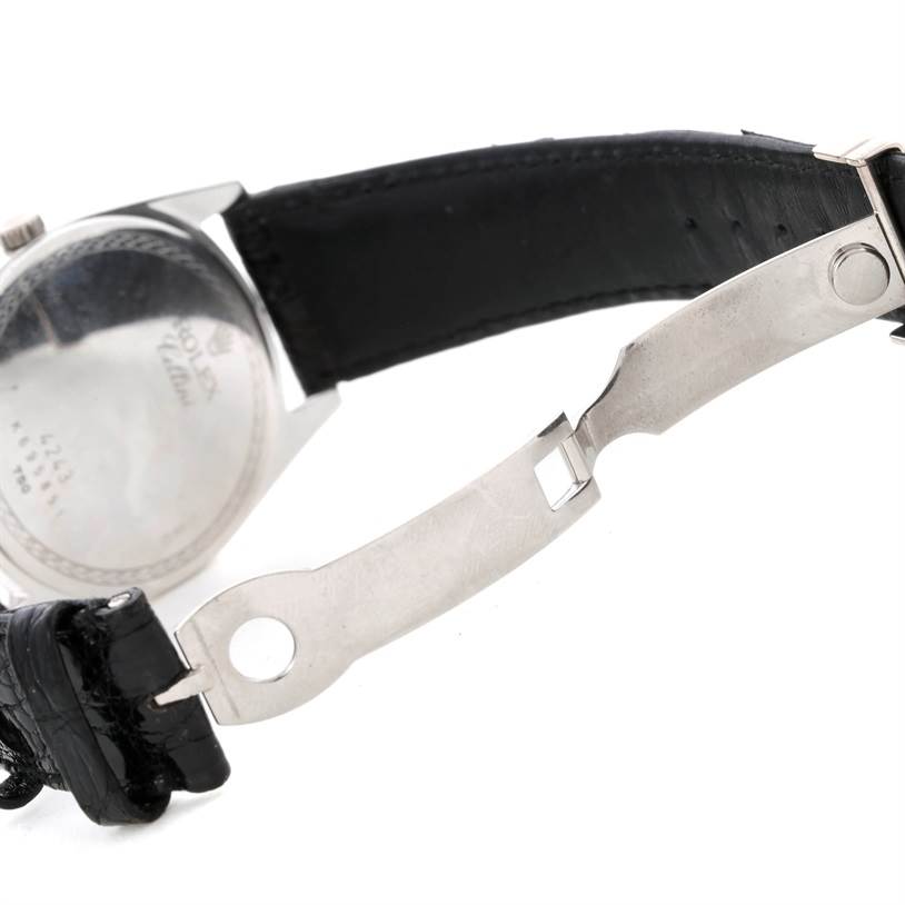 The image shows a partial side and back view of a Rolex Cellini 4243 Men's White Gold Black Dial 4243 Men's White Gold Black Dial watch, focusing on the leather strap and metal clasp.