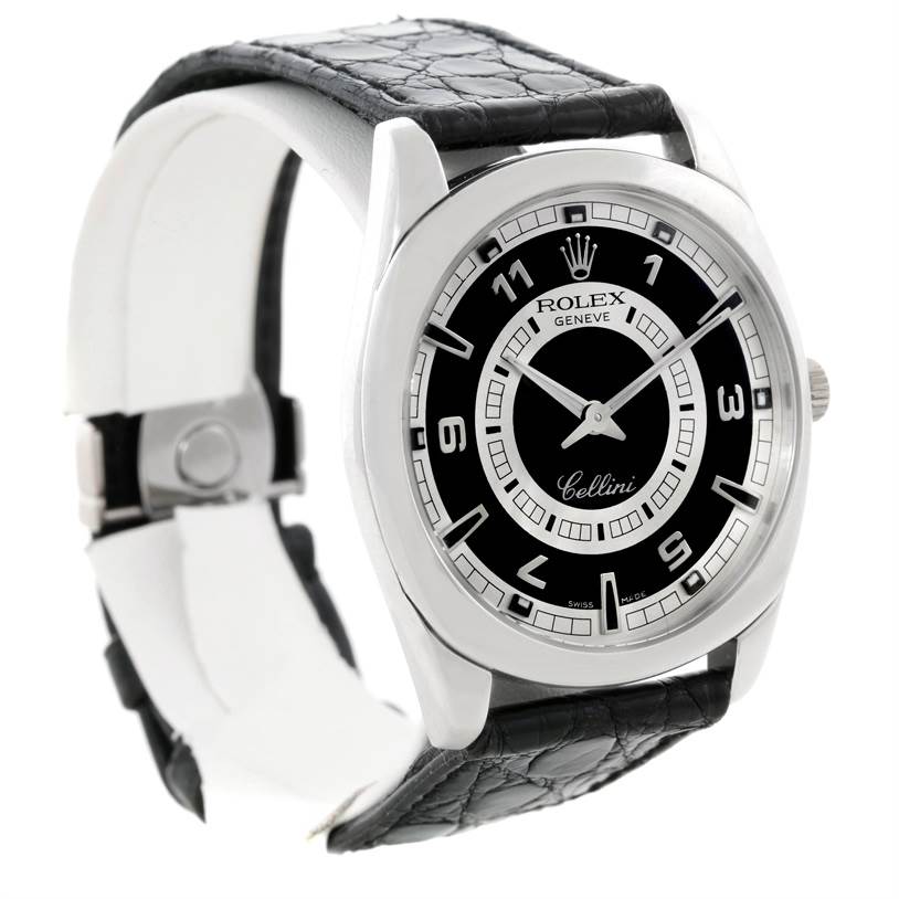 The Rolex Cellini 4243 Men's White Gold Black Dial 4243 Men's White Gold Black Dial watch is shown at a slight angle, highlighting its dial, bezel, crown, and leather strap.