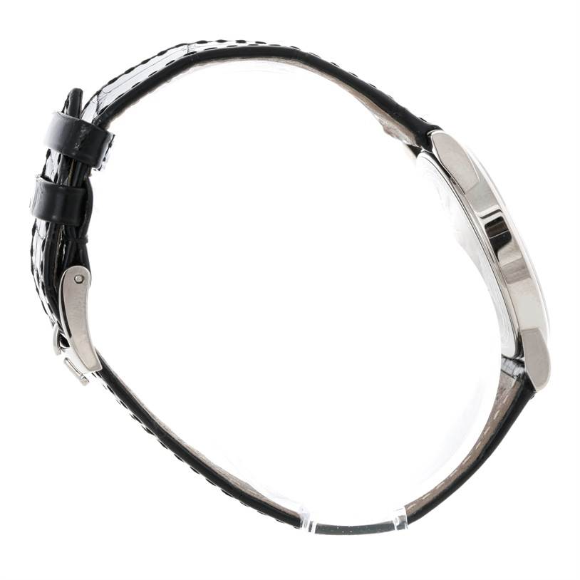 This side-profile image of the Rolex Cellini 5116 Men's White Gold Silver Dial 5116 Men's White Gold Silver Dial watch shows the strap, buckle, and case.