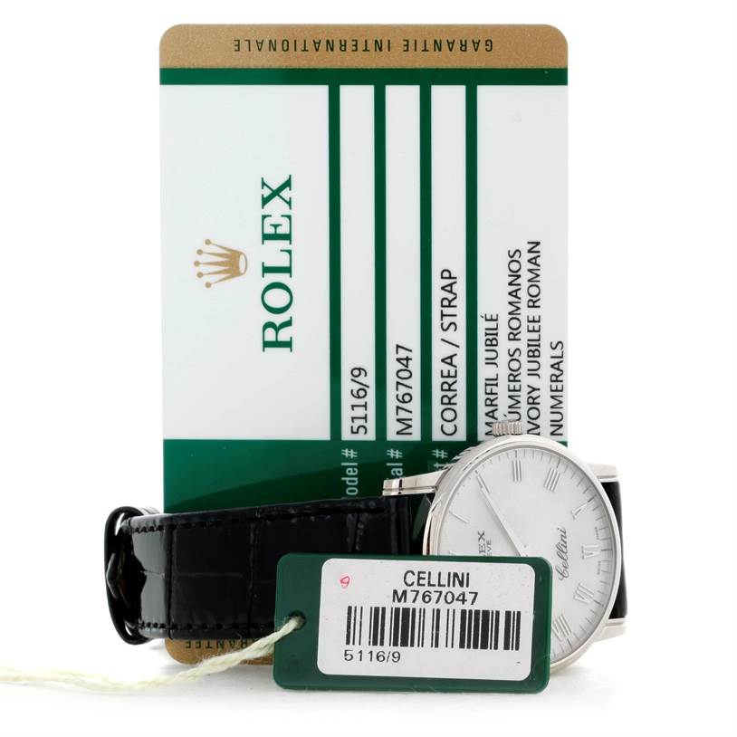 The image shows a partial view of a Rolex Cellini 5116 Men's White Gold Silver Dial 5116 Men's White Gold Silver Dial watch with its strap and identification card.