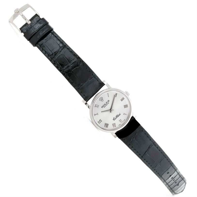 The image shows a frontal view of a Rolex Cellini 5115 Men
s White Gold Silver Dial 5115 Men
s White Gold Silver Dial watch, displaying its face, case, and leather strap.