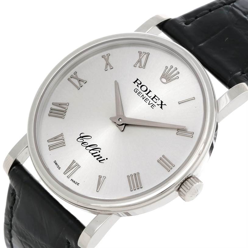 This is a close-up angle of a Rolex Cellini 5115 Men
s White Gold Silver Dial 5115 Men
s White Gold Silver Dial watch, showing the dial, hands, crown, and part of the leather strap.