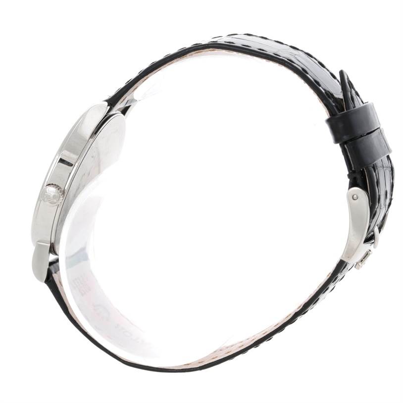 This image shows a side view of a Rolex Cellini 5115 Men
s White Gold Silver Dial 5115 Men
s White Gold Silver Dial watch, highlighting the case and black leather strap.