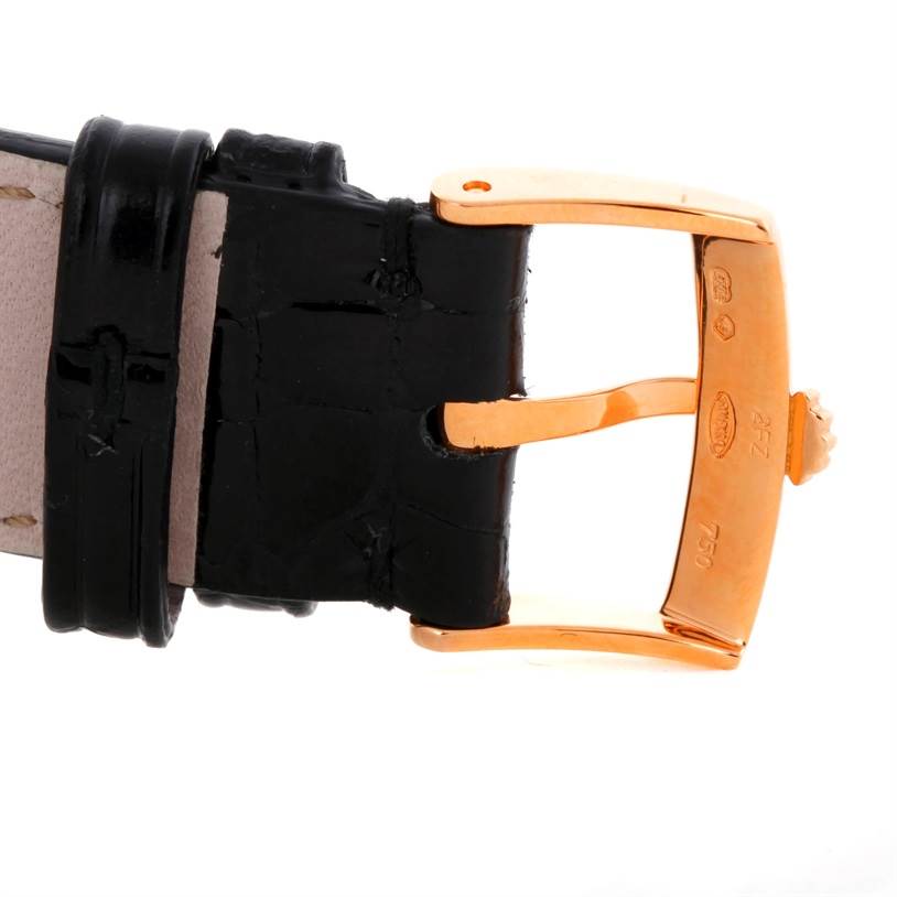 This image shows a close-up view of the buckle and part of the leather strap on a Rolex Cellini 5330 Men's Rose Gold Grey Dial 5330 Men's Rose Gold Grey Dial watch.