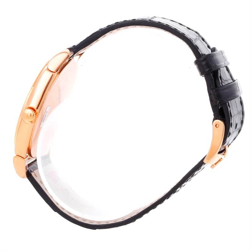 The image shows a Rolex Cellini 5330 Men's Rose Gold Grey Dial 5330 Men's Rose Gold Grey Dial watch from a side profile angle, highlighting its rose gold case and black leather strap.