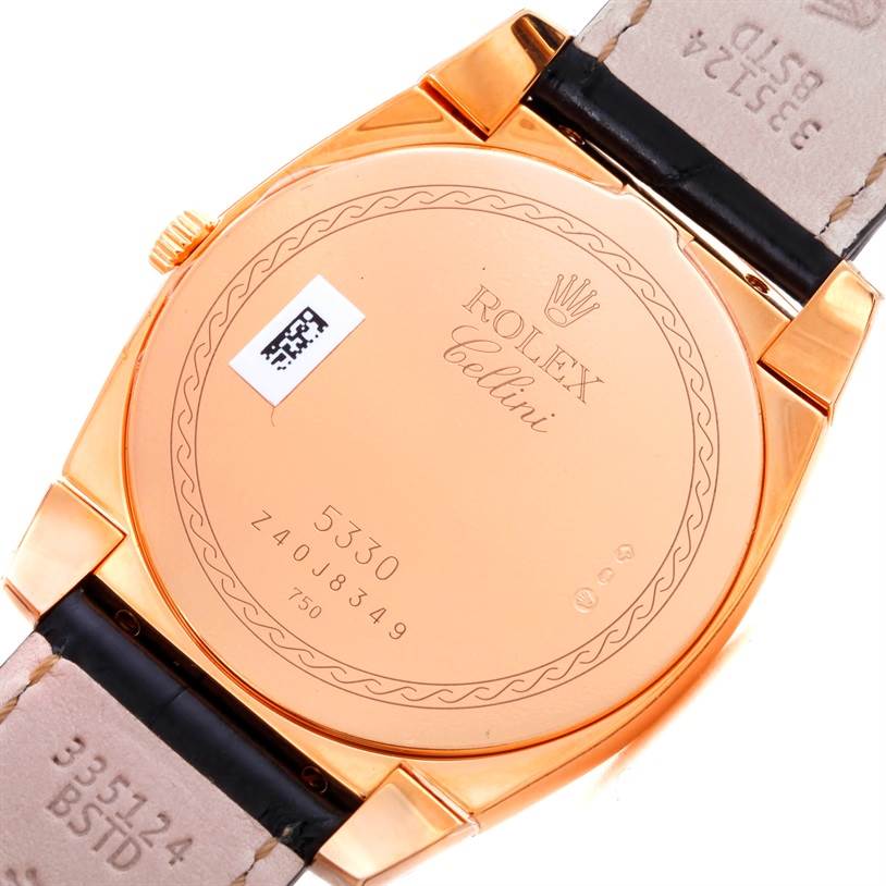 This image shows the back case and partial leather strap of a Rolex Cellini 5330 Men's Rose Gold Grey Dial 5330 Men's Rose Gold Grey Dial watch, highlighting the model number and engravings.