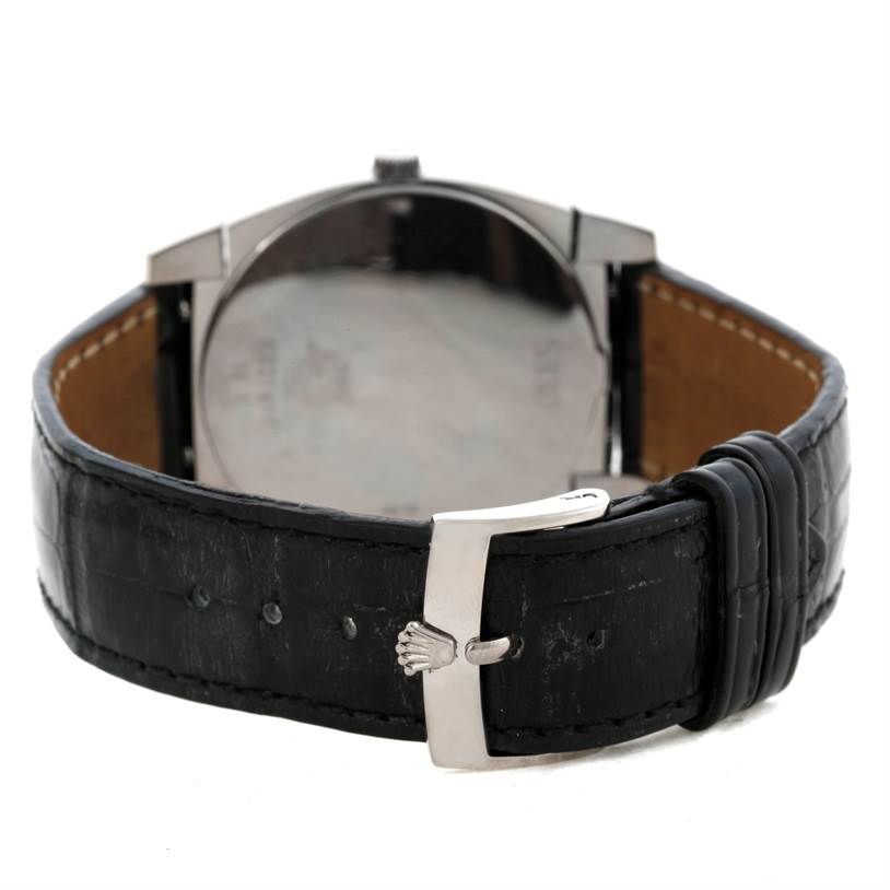 The image shows the backside of a Rolex Cellini 5330 Men's White Gold Mother of Pearl Dial 5330 Men's White Gold Mother of Pearl Dial watch, focusing on the leather strap and the clasp.