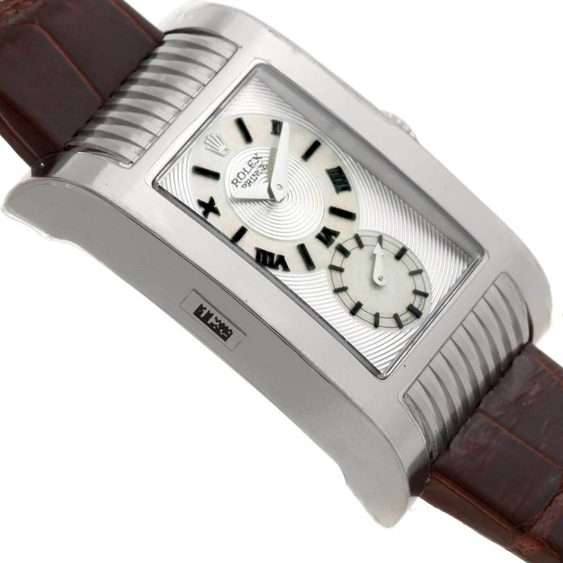 This image shows a close-up, angled view of the watch face and part of the leather strap of the Rolex Cellini 5441 Men's White Gold Silver Dial 5441 Men's White Gold Silver Dial model.
