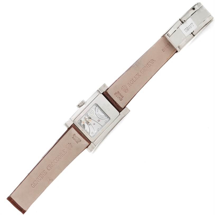 This image shows the back view of a Rolex Cellini 5441 Men's White Gold Silver Dial 5441 Men's White Gold Silver Dial watch with an open leather strap, displaying the case back and movement.