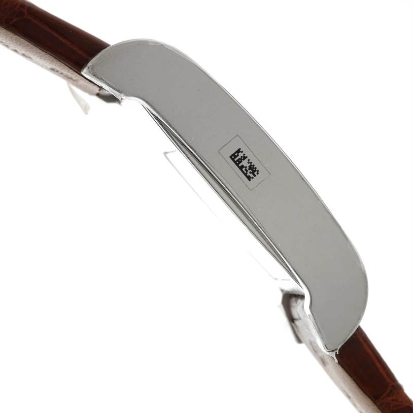 This image shows a side view of a Rolex Cellini 5441 Men's White Gold Silver Dial 5441 Men's White Gold Silver Dial watch, highlighting its stainless steel side case and leather strap.