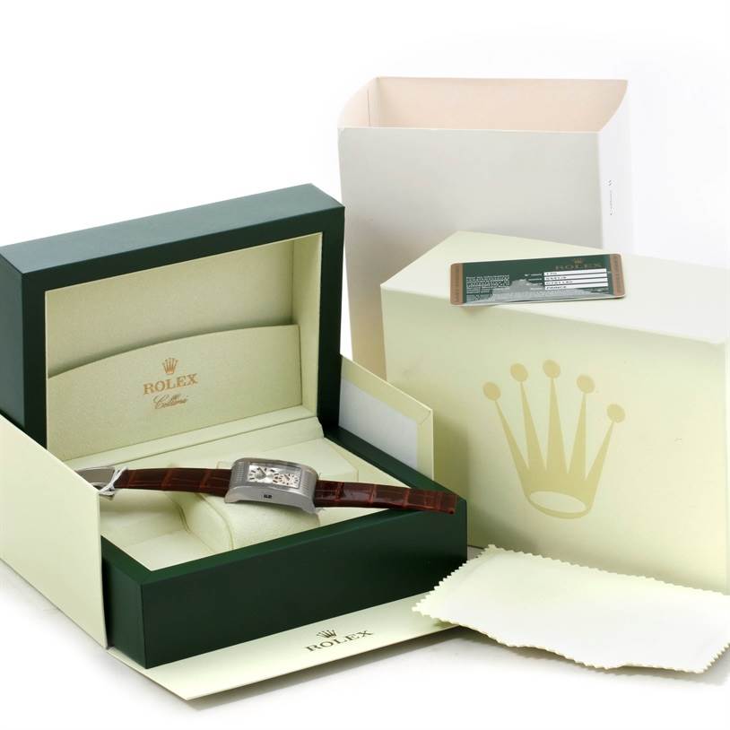 The image shows a Rolex Cellini 5441 Men's White Gold Silver Dial 5441 Men's White Gold Silver Dial watch in its opened box along with additional packaging and a warranty card.