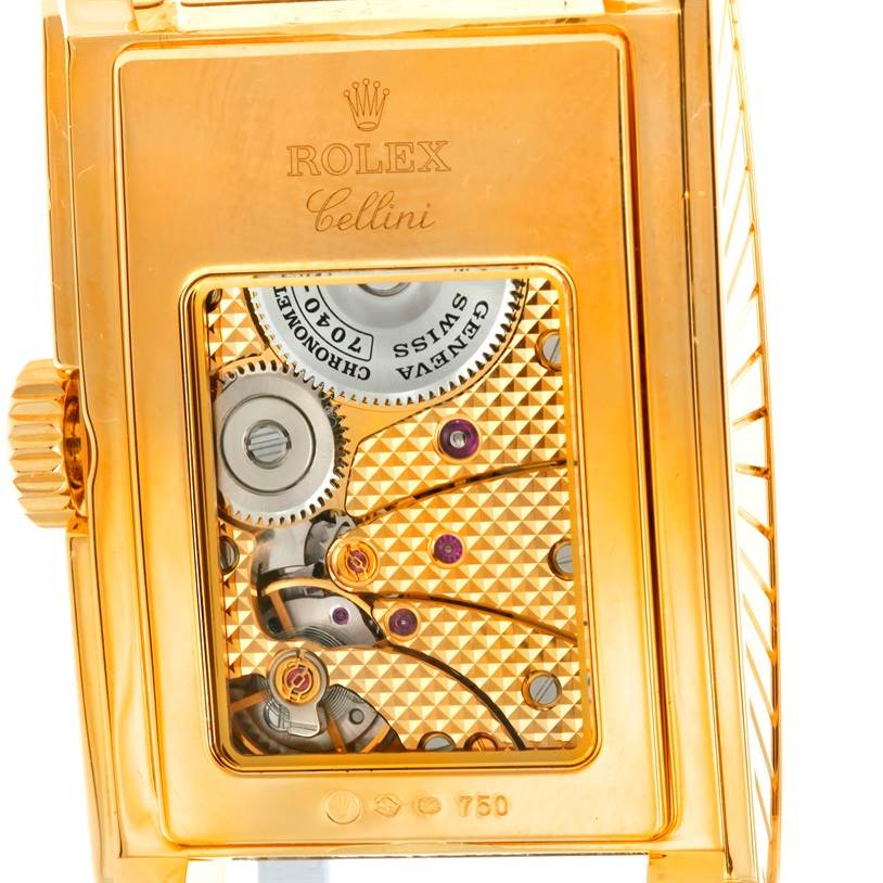 This image shows the back view of a Rolex Cellini 5440 Men's Yellow Gold Champagne Dial 5440 Men's Yellow Gold Champagne Dial watch, revealing its intricate mechanical movement.