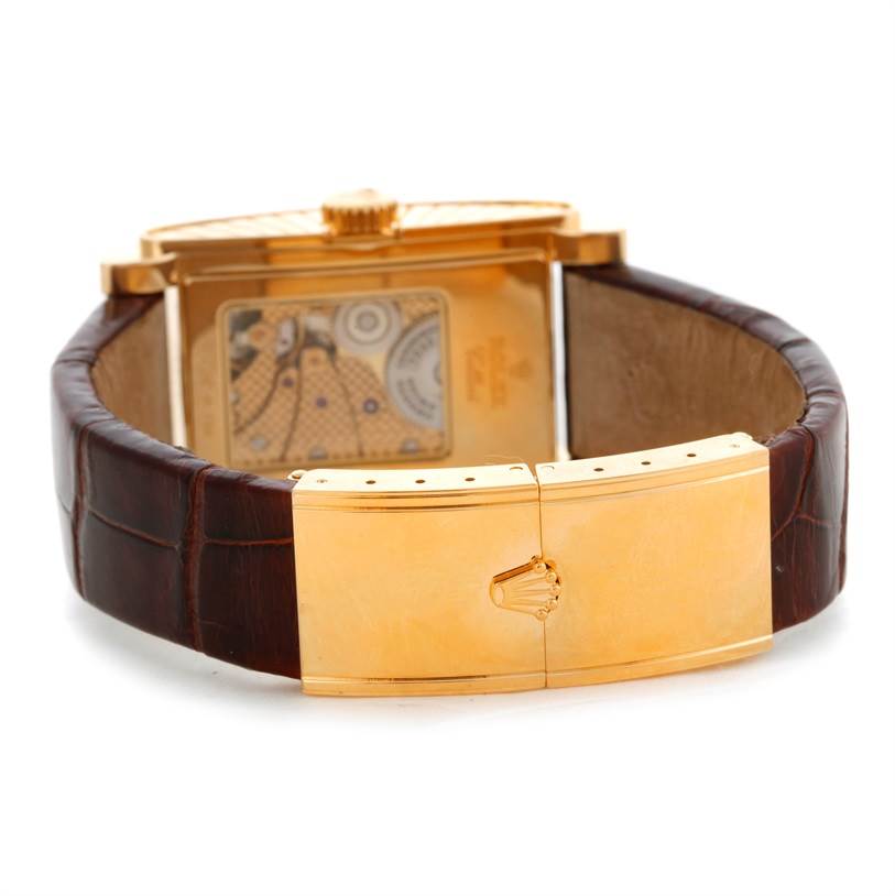 This image shows the back of a Rolex Cellini 5440 Men's Yellow Gold Champagne Dial 5440 Men's Yellow Gold Champagne Dial watch, highlighting its gold clasp and a portion of the caseback.