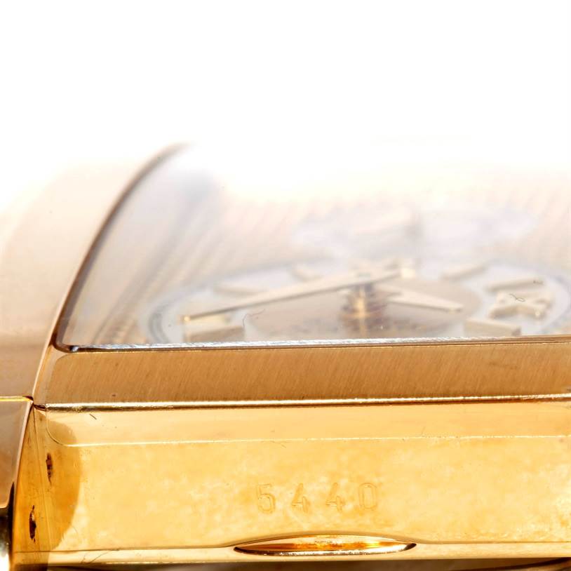 This image shows a close-up view of the side and partial face of a Rolex Cellini 5440 Men's Yellow Gold Champagne Dial 5440 Men's Yellow Gold Champagne Dial watch, highlighting its golden case and engraved model number 5440.