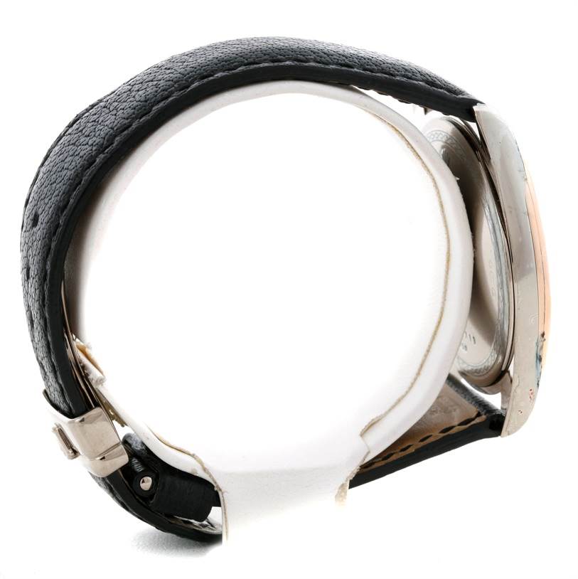 The image shows a side view of a Rolex Cellini Men's White Gold Black Dial Men's White Gold Black Dial watch focusing on the leather strap and part of the watch casing.