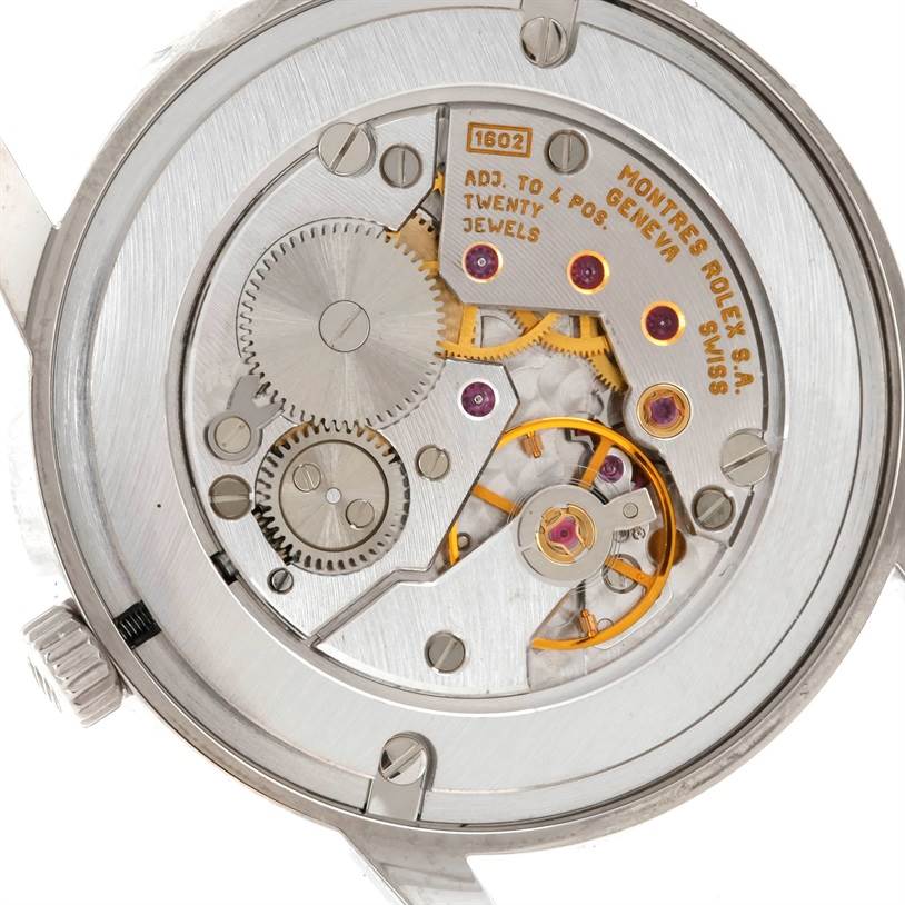 The image shows the internal mechanical movement of the Rolex Cellini 5116 Men's White Gold Black Dial 5116 Men's White Gold Black Dial watch from a rear angle.