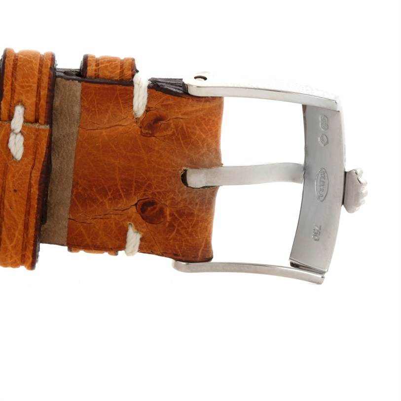 This is a close-up of the buckle and part of the leather strap of a Rolex Cellini 5320 Men's White Gold White Dial 5320 Men's White Gold White Dial watch.