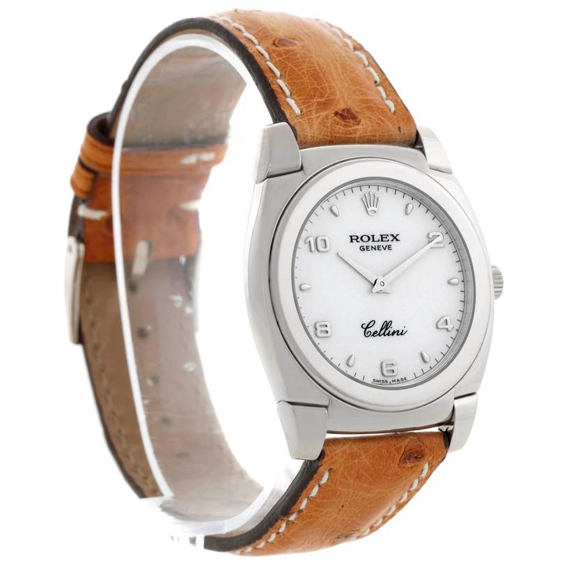 The image shows a Rolex Cellini 5320 Men's White Gold White Dial 5320 Men's White Gold White Dial watch at a three-quarter angle, highlighting the white dial, numeric markers, and brown leather strap.
