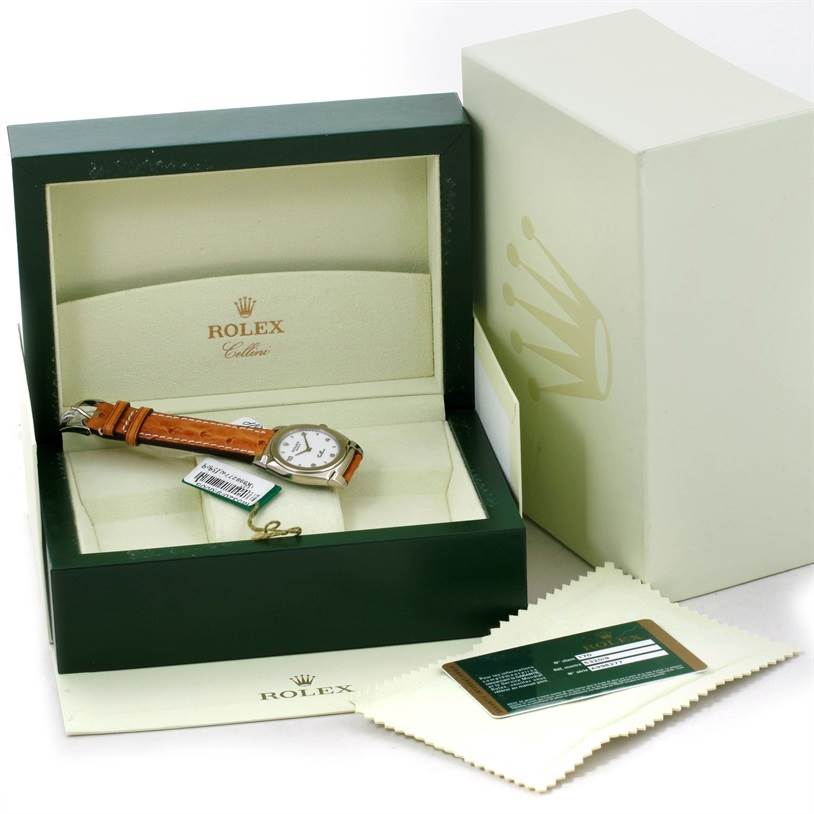 The image shows a Rolex Cellini 5320 Men's White Gold White Dial 5320 Men's White Gold White Dial watch in its box, along with an outer box, booklet, and polishing cloth.