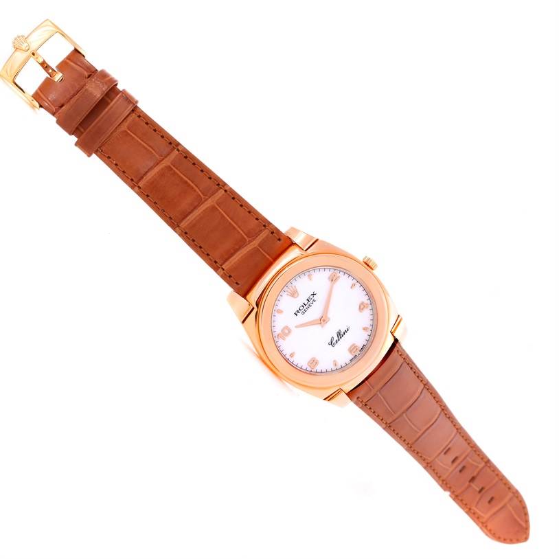 The image shows a top view of a Rolex Cellini 5330 Men's Rose Gold White Dial 5330 Men's Rose Gold White Dial watch, featuring the face, bezel, crown, and leather strap with a buckle.