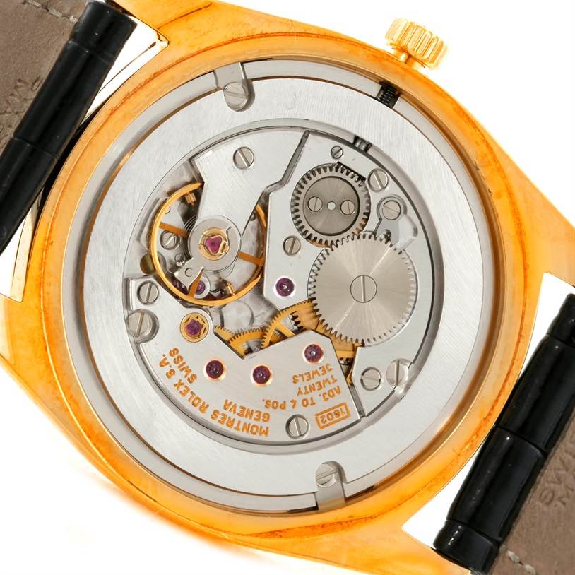 This image shows the back view of the Rolex Cellini 4233 Men
s Yellow Gold Black Dial 4233 Men
s Yellow Gold Black Dial model, revealing its intricate movement mechanism.