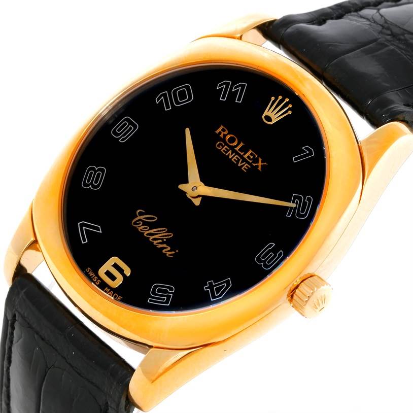 The image shows a close-up of a Rolex Cellini 4233 Men
s Yellow Gold Black Dial 4233 Men
s Yellow Gold Black Dial watch, displaying the dial, crown, and part of the leather strap.