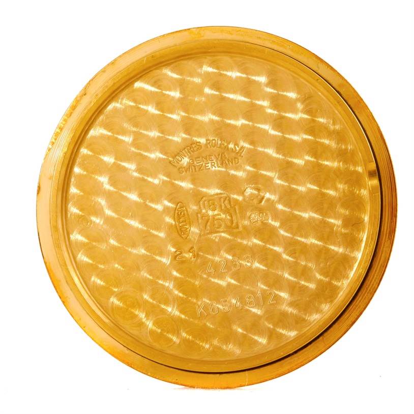 This image shows the interior case back of a Rolex Cellini 4233 Men
s Yellow Gold Black Dial 4233 Men
s Yellow Gold Black Dial watch, viewed from straight above.