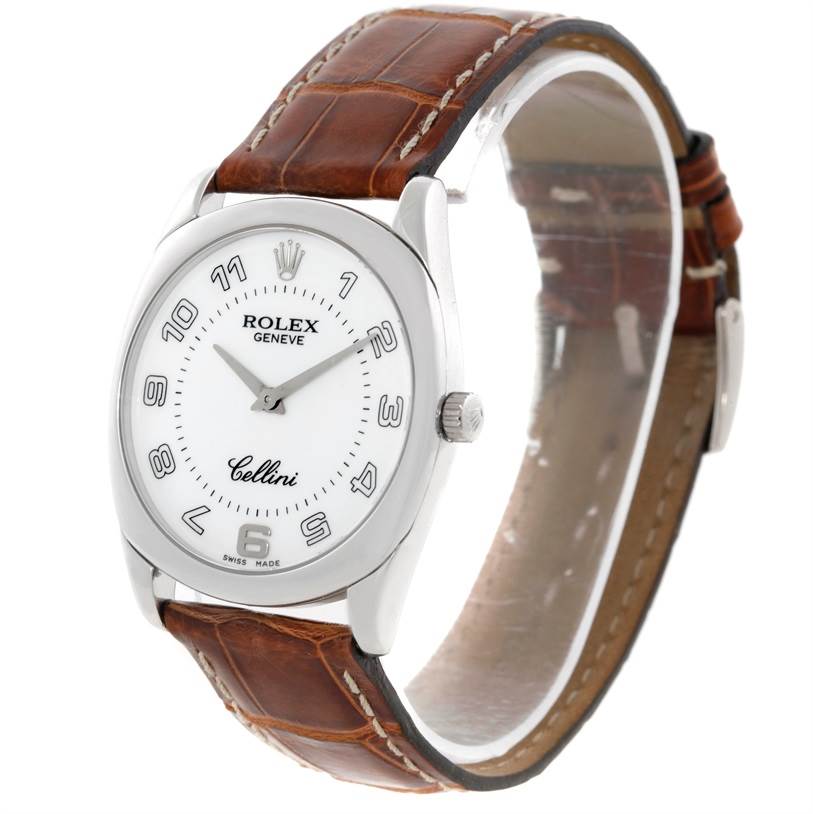 This image shows a front-quarter view of a Rolex Cellini 4233 Men's White Gold White Dial 4233 Men's White Gold White Dial watch with a white dial and a brown leather strap.