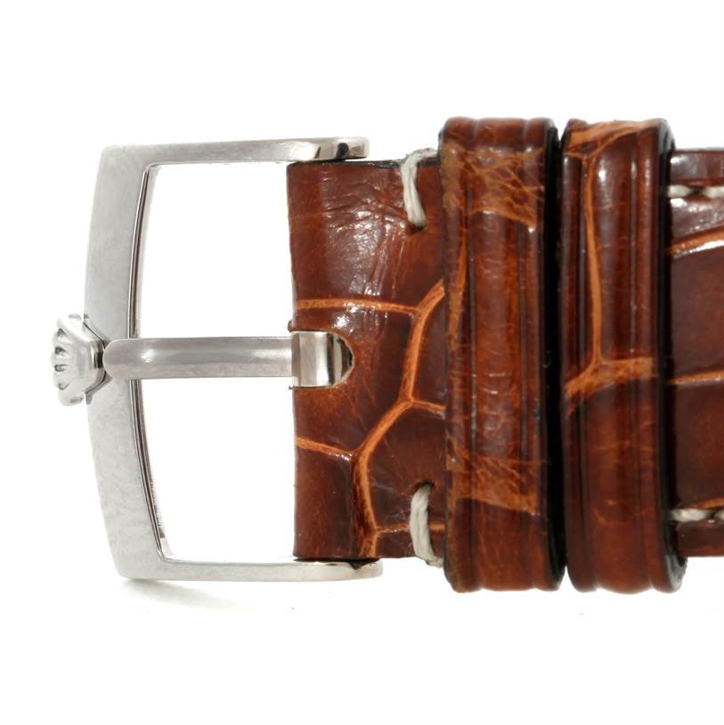 This image shows a close-up of a brown leather strap and buckle from a Rolex Cellini 4233 Men's White Gold White Dial 4233 Men's White Gold White Dial watch.