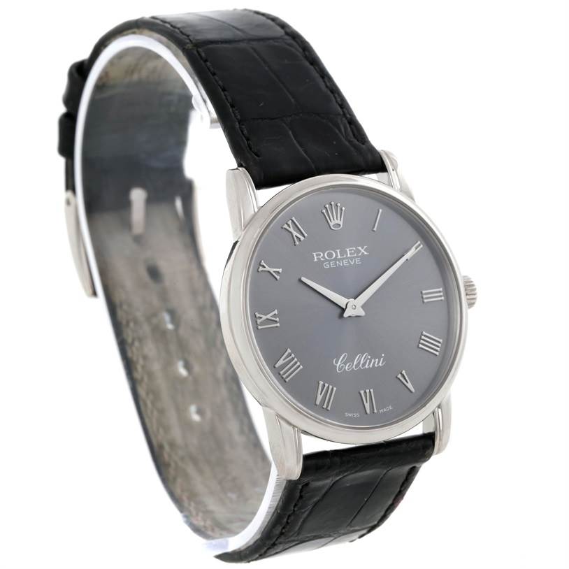 The Rolex Cellini 5116 Men's White Gold Grey Dial 5116 Men's White Gold Grey Dial watch is shown at an angle displaying the face, the leather strap, and the side profile of the casing.