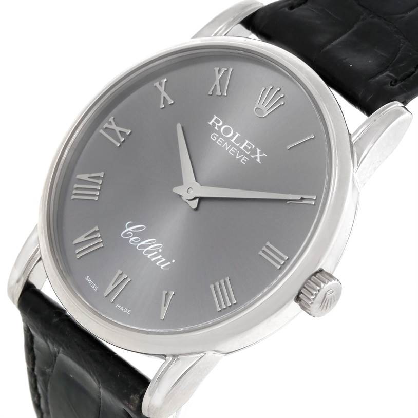 This is a close-up angled view of the Rolex Cellini 5116 Men's White Gold Grey Dial 5116 Men's White Gold Grey Dial watch showing its dial, crown, case, and part of the leather strap.