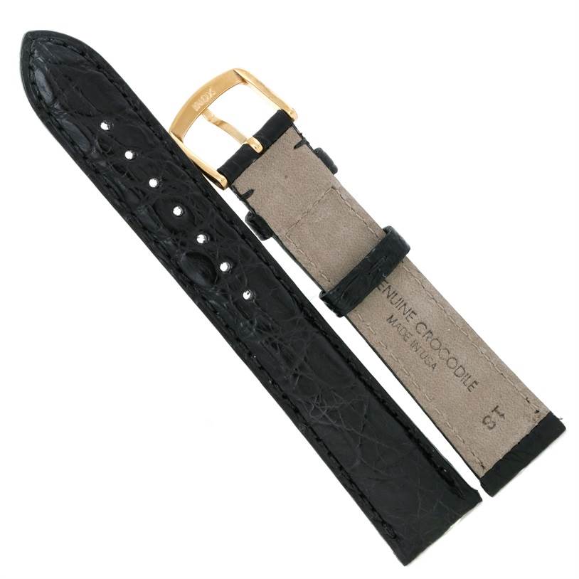 This image shows a black genuine crocodile leather strap for the Rolex Cellini 5116 Men's White Gold Grey Dial 5116 Men's White Gold Grey Dial model, including the gold buckle.