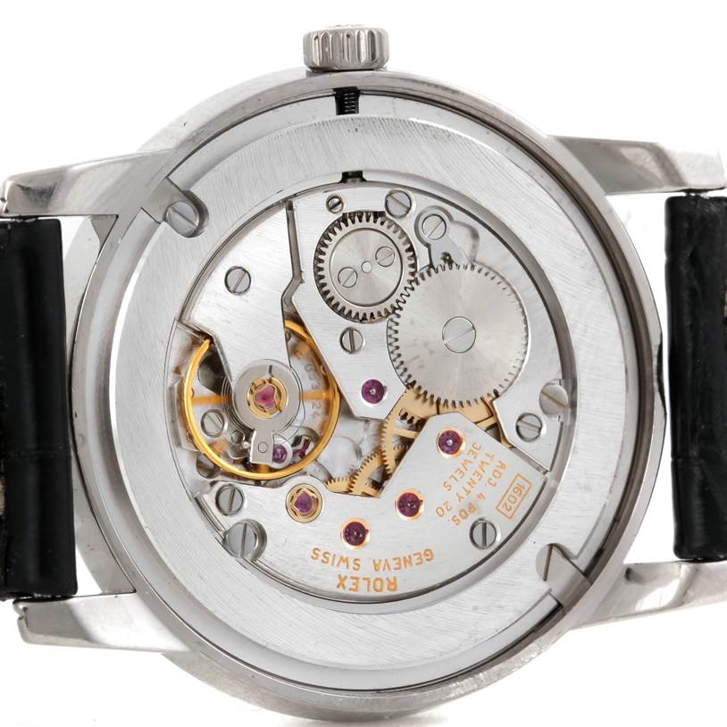 This image shows the back of the Rolex Cellini 5116 Men's White Gold Grey Dial 5116 Men's White Gold Grey Dial watch, exposing its intricate mechanical movement and gears.