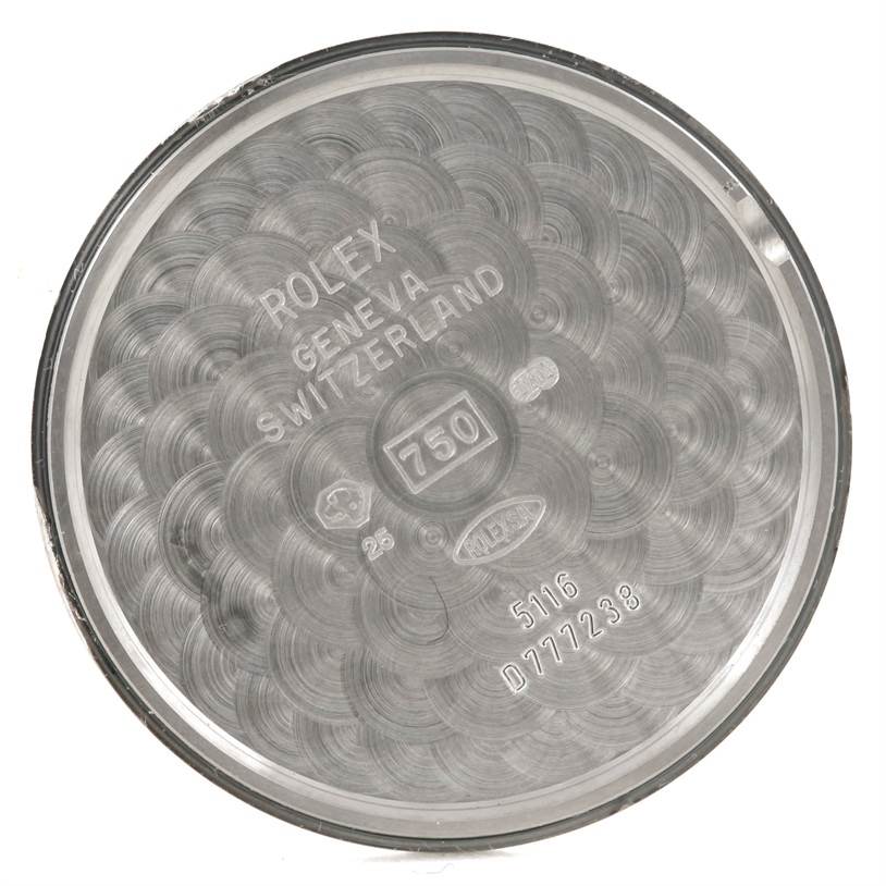 This is a close-up view of the inside case back of a Rolex Cellini 5116 Men's White Gold Grey Dial 5116 Men's White Gold Grey Dial watch, showing engravings and hallmarks.