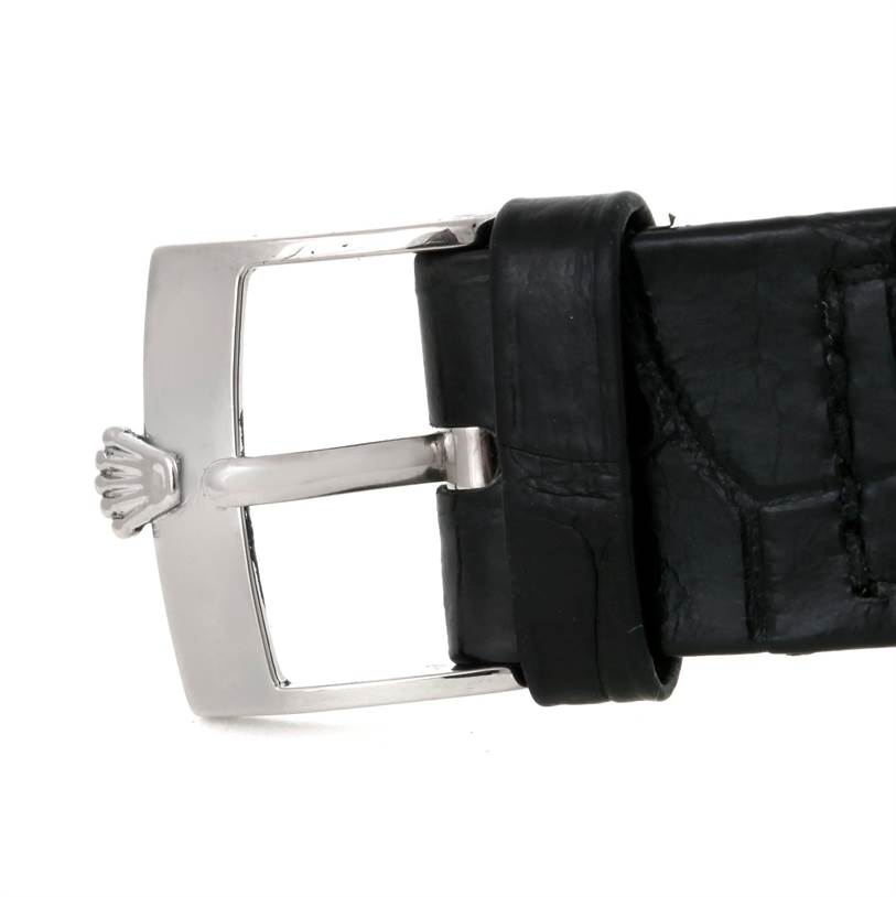 This image shows a close-up of the buckle and part of the leather strap of a Rolex Cellini 5116 Men's White Gold Grey Dial 5116 Men's White Gold Grey Dial watch.