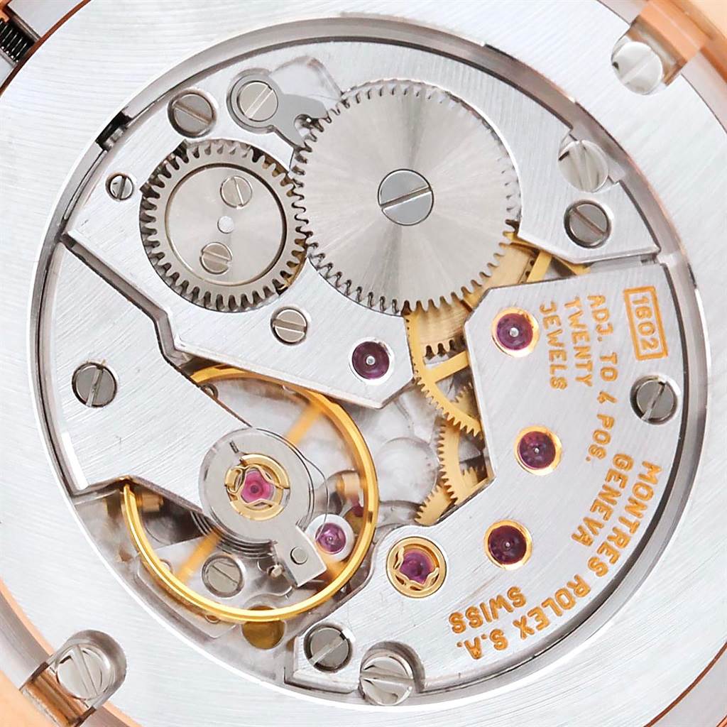 This image shows a close-up of the movement parts inside a Rolex Cellini 5330 Men's Rose Gold White Dial 5330 Men's Rose Gold White Dial watch.