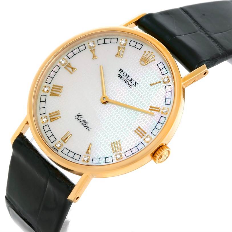 The Rolex Cellini 5112 Men's Yellow Gold Mother of Pearl Dial 5112 Men's Yellow Gold Mother of Pearl Dial watch is shown at a slight angle, focusing on its face, gold case, and black leather strap.